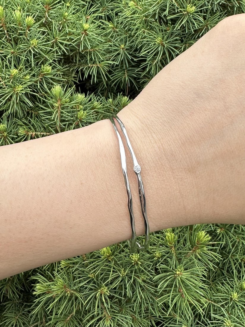 Pair of White Gold Slip On Bangle Bracelets with 0.16ctw Bezel Diamonds: Pair of White Gold Slip On Bangle Bracelets with 0.16ctw Bezel Diamonds Pair of slip-on bangle bracelets in solid 17-18K white gold, each set with natural round brilliant cut diamonds in bezel-style b