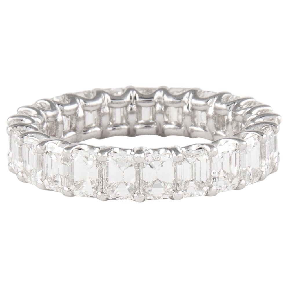 18k White Gold Emerald Cut Diamond Eternity Ring 4.26ct Size 6: 18k White Gold Emerald Cut Diamond Eternity Ring 4.26ct Size 6 Un-used emerald cut diamond eternity band featuring 23 emerald cut diamonds totaling 4.26 ct. The diamonds are graded D-F color and VS cl