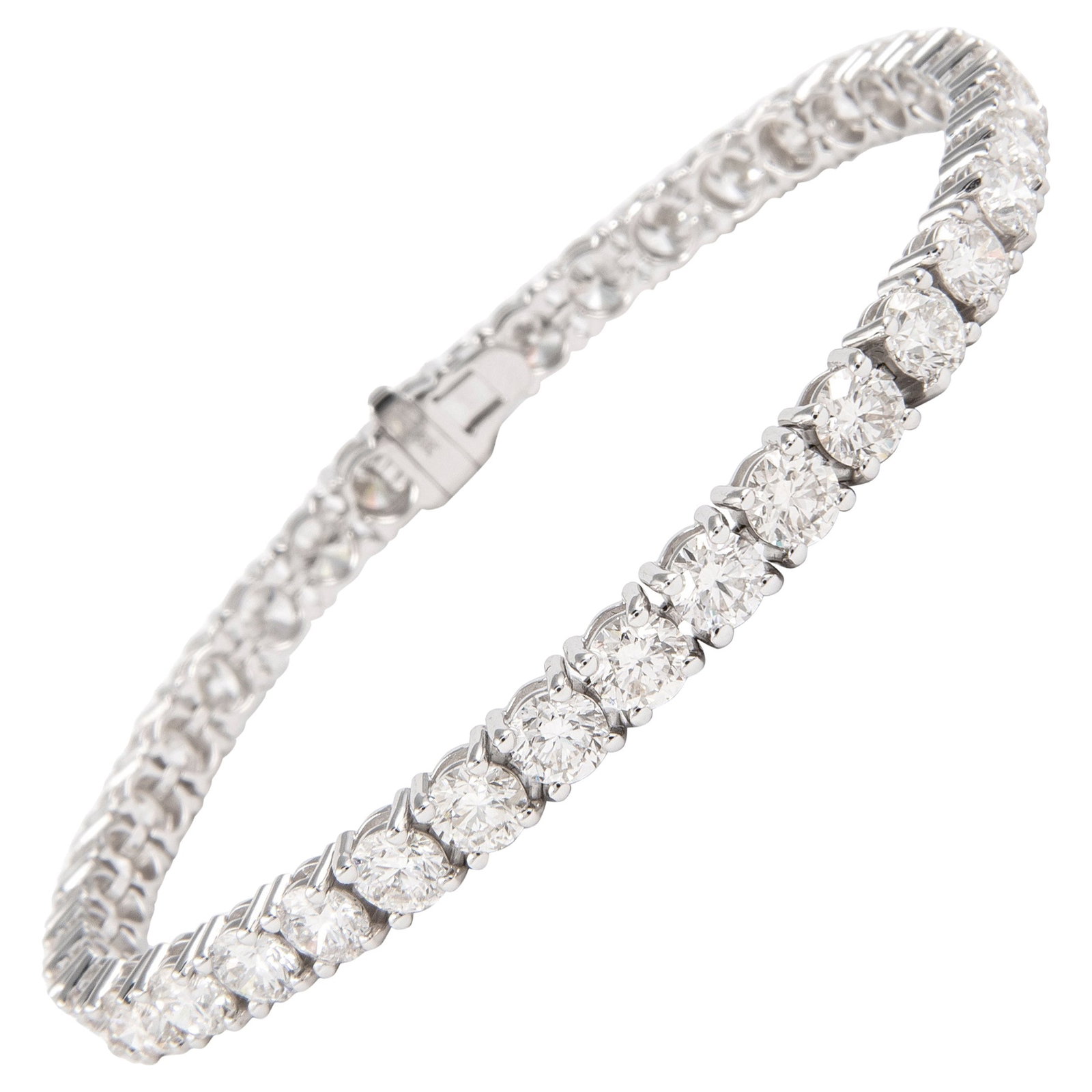 18k White Gold Diamond Tennis Bracelet 10.95ct: 18k White Gold Diamond Tennis Bracelet 10.95ct Diamond tennis bracelet set with 38 round brilliant diamonds totaling 10.95 ct. The diamonds are approximately F/G color and VS2 clarity, set in a four-p
