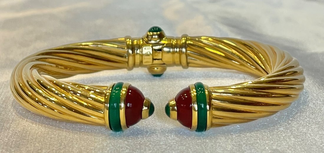 Italian 18K Yellow Gold Wrap Bracelet with Emerald and Enamel: Italian 18K Yellow Gold Wrap Bracelet with Emerald and Enamel Italian-made wrap bracelet crafted in 18k yellow gold with emerald and enameled detailing. This pre-owned piece features detailed workmans