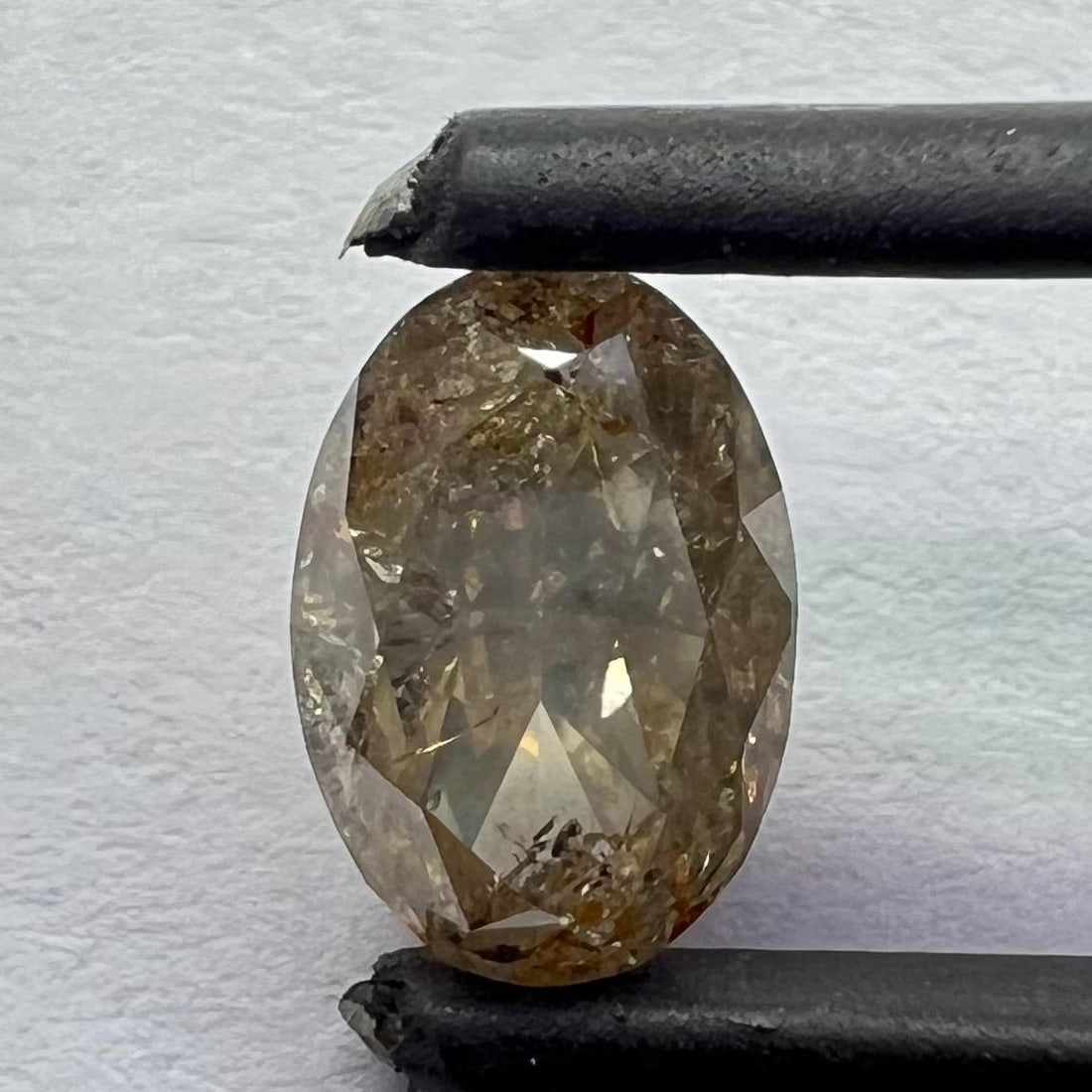 Loose Diamond - OVAL 1.27ct Fancy White I1: Loose Diamond - OVAL 1.27ct Fancy White I1 Source: Natural Shape: OVAL Carats: 1.27 Color: Fancy White Certification: NONE The Diamond Depot Guarantee: All items in this auction are guaranteed to be 1