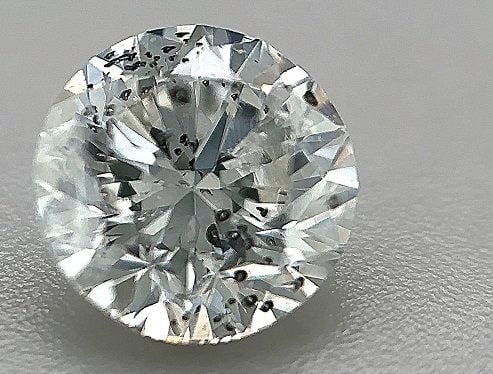 Loose Diamond - ROUND 1.0ct E I1: Loose Diamond - ROUND 1.0ct E I1 Source: Natural Shape: ROUND Carats: 1.0 Color: E Clarity: I1 Certification: OTHER The Diamond Depot Guarantee: All items in this auction are guaranteed to be 100% aut