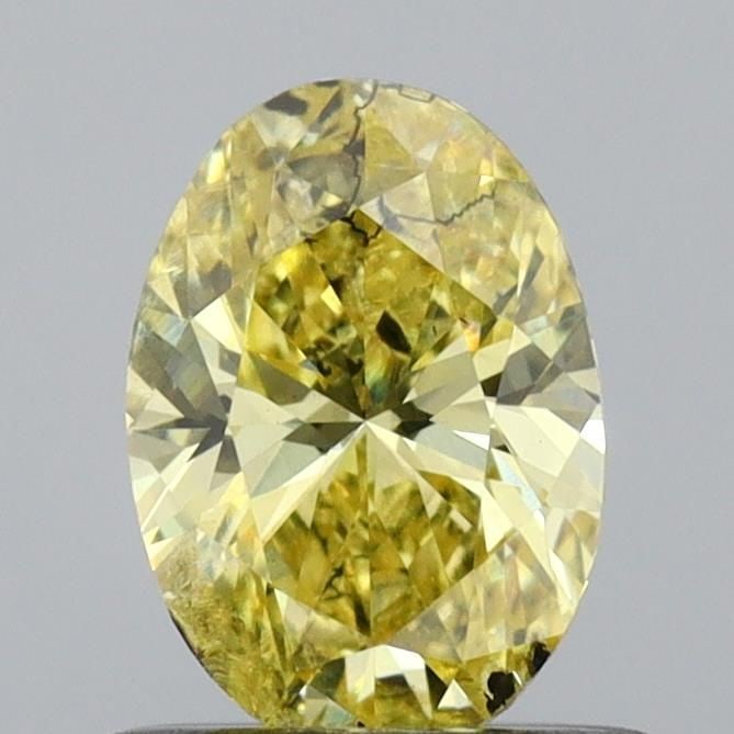 Loose Diamond - OVAL 0.62ct Fancy Vivid Yellow I1: Loose Diamond - OVAL 0.62ct Fancy Vivid Yellow I1 Source: This is a real non-mined Diamond that has been grown in a lab Shape: OVAL Carats: 0.62 Color: Fancy Vivid Yellow Certification: IGI Video: