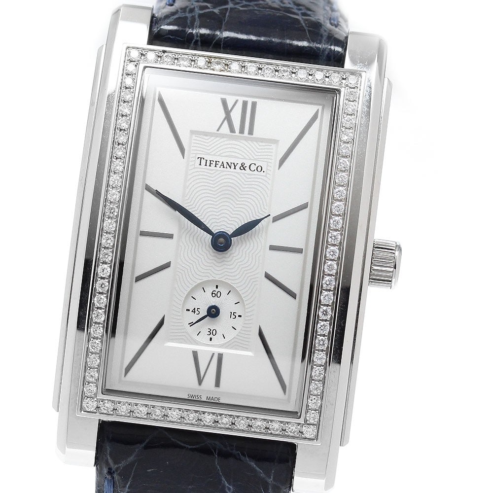 Tiffany Co Grand men's quartz wristwatch ref Z0030.13.10B21A40A small seconds: Tiffany Co Grand men's quartz wristwatch ref Z0030.13.10B21A40A small seconds Tiffany & Co. Grand men's wristwatch with a diamond bezel and small seconds display. This Swiss-made quartz watch features
