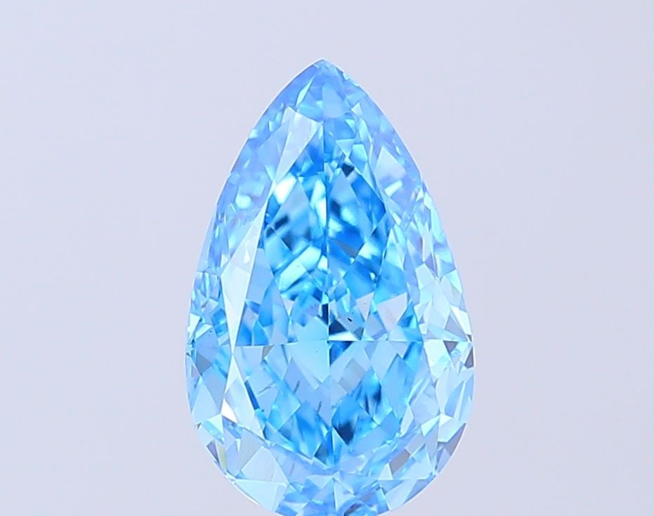 Loose Diamond - PEAR 3.03ct Fancy Vivid Blue VS1: Loose Diamond - PEAR 3.03ct Fancy Vivid Blue VS1 Source: This is a real non-mined Diamond that has been grown in a lab Shape: PEAR Carats: 3.03 Color: Fancy Vivid Blue Certification: IGI Video: