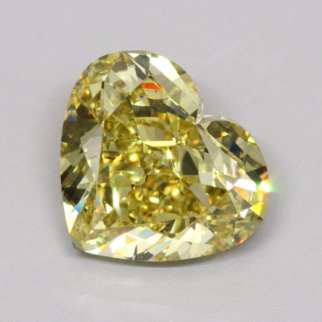 Loose Diamond - HEART 7.02ct Fancy Intense Yellow VS2: Loose Diamond - HEART 7.02ct Fancy Intense Yellow VS2 Source: This is a real non-mined Diamond that has been grown in a lab Shape: HEART Carats: 7.02 Color: Fancy Intense Yellow Certification: IGI Vid