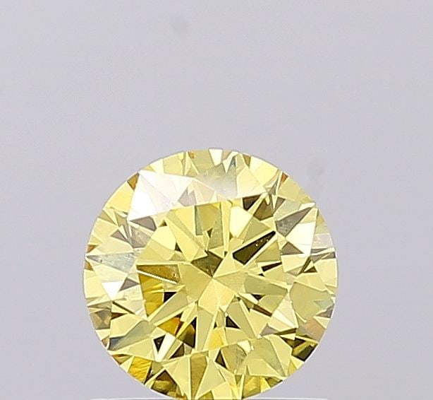 Loose Diamond - ROUND 0.87ct Fancy Intense Yellow VS1: Loose Diamond - ROUND 0.87ct Fancy Intense Yellow VS1 Source: This is a real non-mined Diamond that has been grown in a lab Shape: ROUND Carats: 0.87 Color: Fancy Intense Yellow Certification: IGI Vid