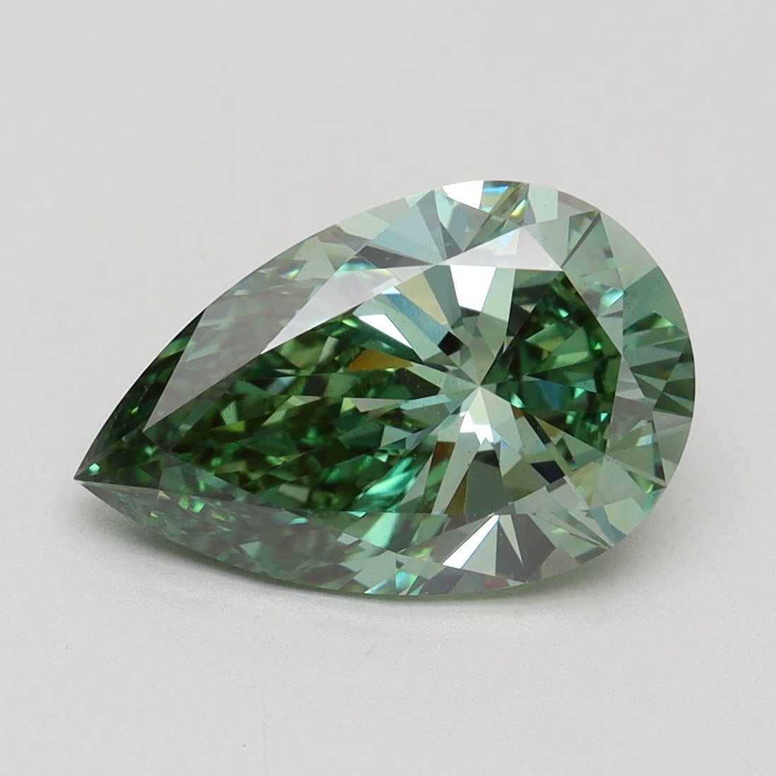 Loose Diamond - PEAR 3.11ct Fancy Vivid Green VS2: Loose Diamond - PEAR 3.11ct Fancy Vivid Green VS2 Source: This is a real non-mined Diamond that has been grown in a lab Shape: PEAR Carats: 3.11 Color: Fancy Vivid Green Certification: IGI Video: