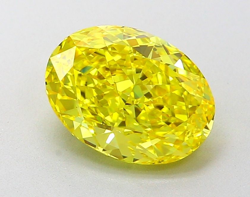 Loose Diamond - OVAL 2.06ct Fancy Vivid Yellow VVS2: Loose Diamond - OVAL 2.06ct Fancy Vivid Yellow VVS2 Source: This is a real non-mined Diamond that has been grown in a lab Shape: OVAL Carats: 2.06 Color: Fancy Vivid Yellow Certification: IGI Video: