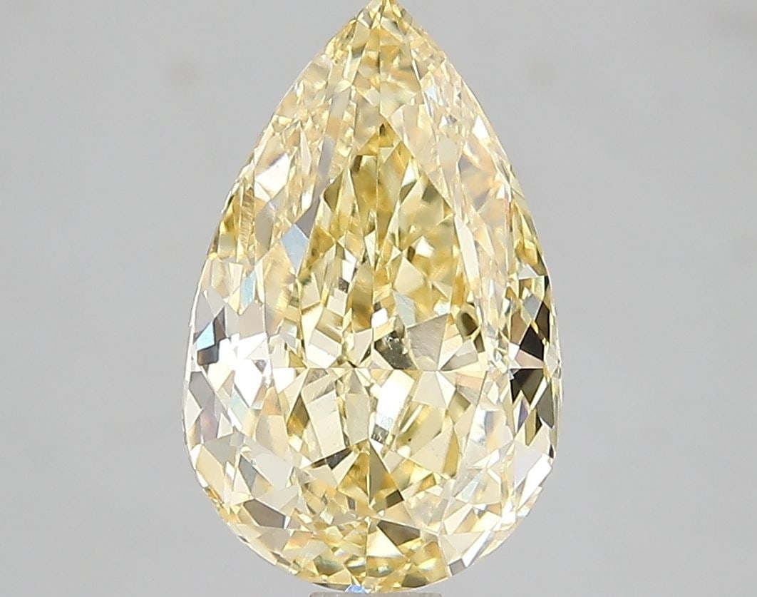 Loose Diamond - PEAR 3.1ct Fancy Intense Yellow VS1: Loose Diamond - PEAR 3.1ct Fancy Intense Yellow VS1 Source: This is a real non-mined Diamond that has been grown in a lab Shape: PEAR Carats: 3.1 Color: Fancy Intense Yellow Certification: IGI Video:
