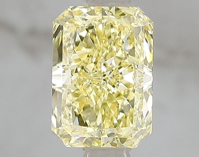 Loose Diamond - RADIANT 1.6ct Fancy Vivid Yellow VS2: Loose Diamond - RADIANT 1.6ct Fancy Vivid Yellow VS2 Source: This is a real non-mined Diamond that has been grown in a lab Shape: RADIANT Carats: 1.6 Color: Fancy Vivid Yellow Certification: IGI Video
