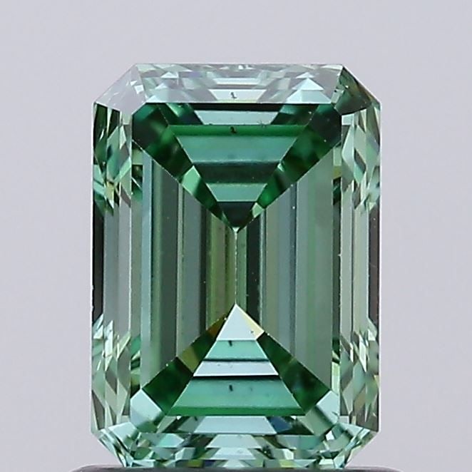 Loose Diamond - EMERALD 0.88ct Fancy Vivid Green VS2: Loose Diamond - EMERALD 0.88ct Fancy Vivid Green VS2 Source: This is a real non-mined Diamond that has been grown in a lab Shape: EMERALD Carats: 0.88 Color: Fancy Vivid Green Certification: IGI Video