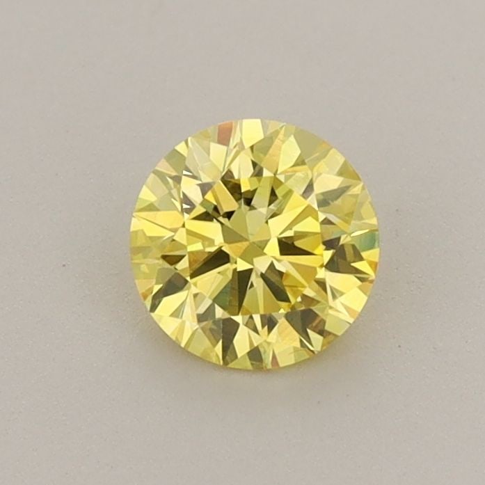 Loose Diamond - ROUND 0.53ct Fancy Vivid Yellow VVS2: Loose Diamond - ROUND 0.53ct Fancy Vivid Yellow VVS2 Source: This is a real non-mined Diamond that has been grown in a lab Shape: ROUND Carats: 0.53 Color: Fancy Vivid Yellow Certification: IGI Video: