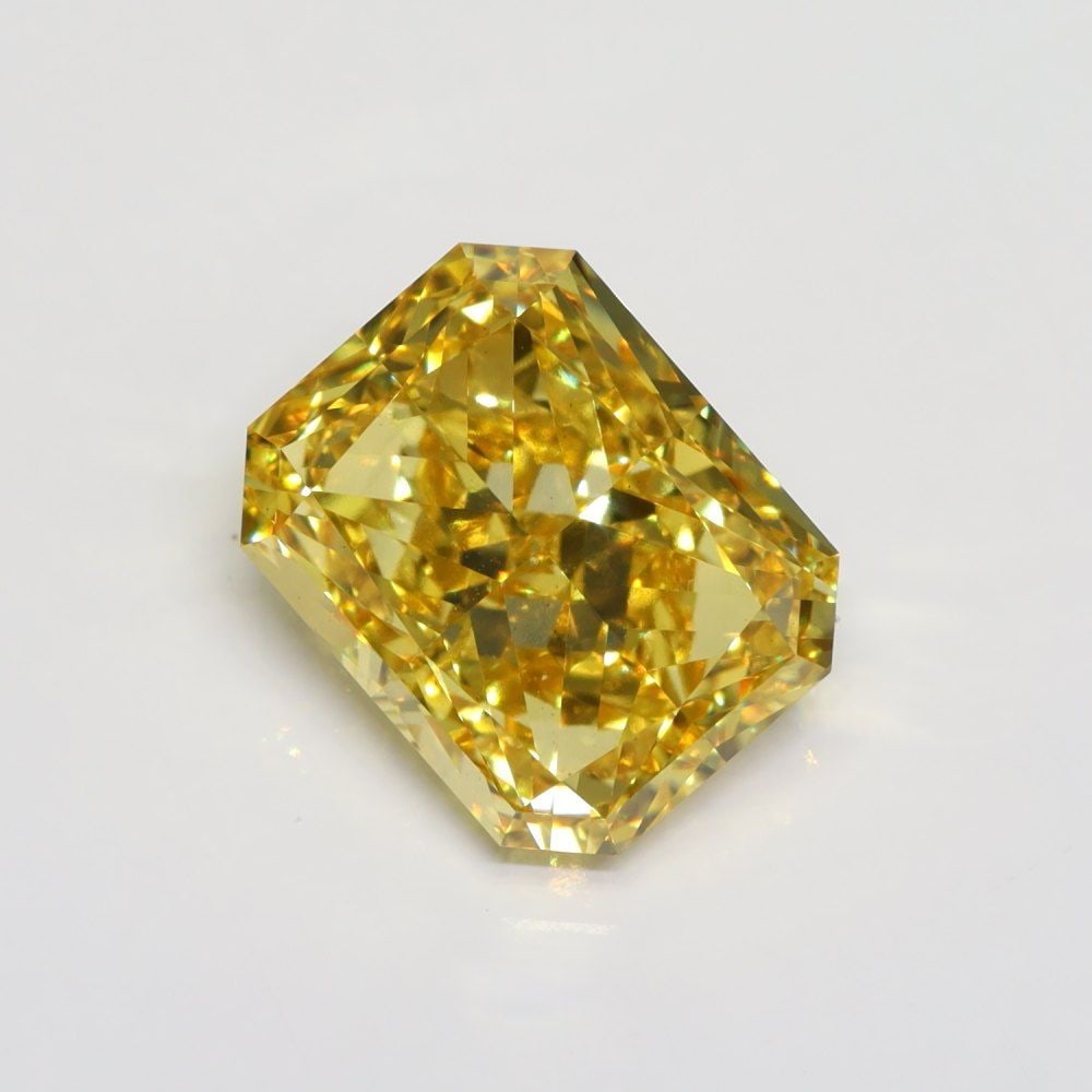 Loose Diamond - RADIANT 7.5ct Fancy Vivid Yellow VS1: Loose Diamond - RADIANT 7.5ct Fancy Vivid Yellow VS1 Source: This is a real non-mined Diamond that has been grown in a lab Shape: RADIANT Carats: 7.5 Color: Fancy Vivid Yellow Certification: IGI Video