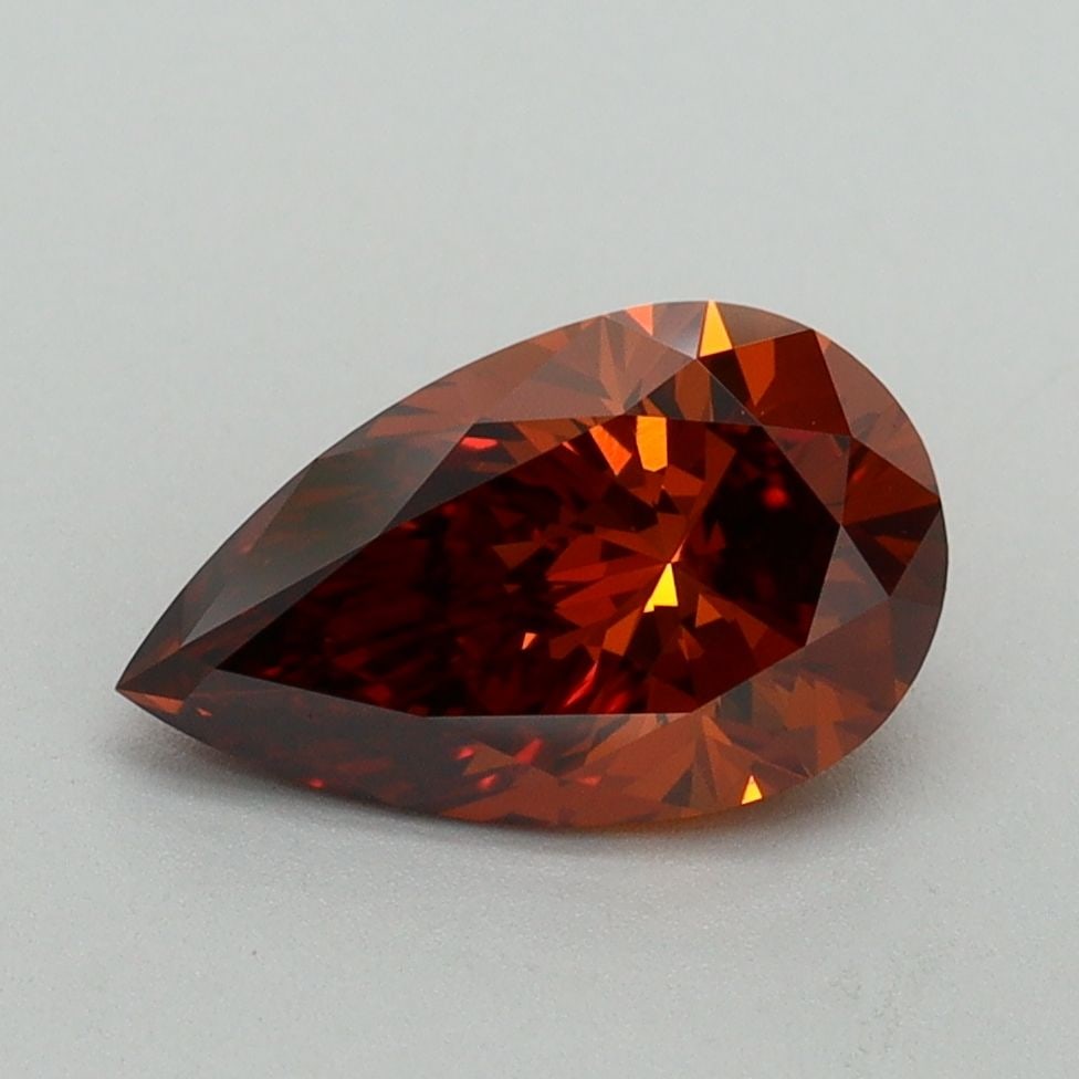 Loose Diamond - PEAR 1.48ct Fancy Vivid Orange VS1: Loose Diamond - PEAR 1.48ct Fancy Vivid Orange VS1 Source: This is a real non-mined Diamond that has been grown in a lab Shape: PEAR Carats: 1.48 Color: Fancy Vivid Orange Certification: IGI Video: