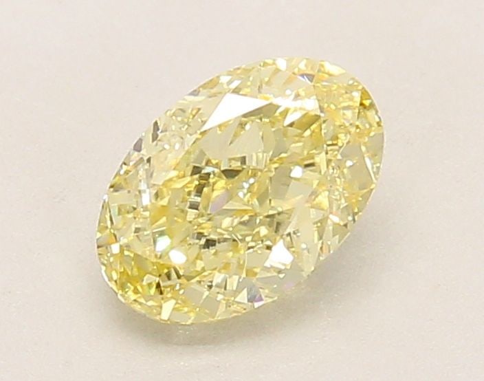 Loose Diamond - OVAL 1.1ct Fancy Yellow VVS2: Loose Diamond - OVAL 1.1ct Fancy Yellow VVS2 Source: This is a real non-mined Diamond that has been grown in a lab Shape: OVAL Carats: 1.1 Color: Fancy Yellow Certification: IGI Video: