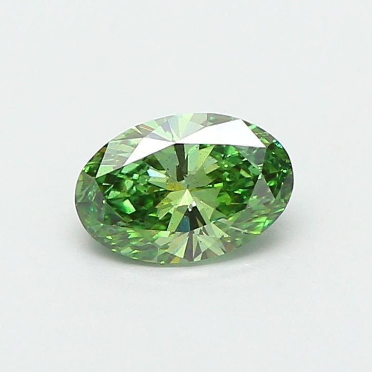 Loose Diamond - OVAL 0.7ct Fancy Vivid Green SI1: Loose Diamond - OVAL 0.7ct Fancy Vivid Green SI1 Source: This is a real non-mined Diamond that has been grown in a lab Shape: OVAL Carats: 0.7 Color: Fancy Vivid Green Certification: IGI Video:
