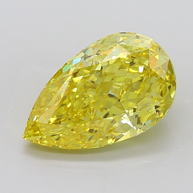 Loose Diamond - PEAR 6.74ct Fancy Vivid Yellow VS1: Loose Diamond - PEAR 6.74ct Fancy Vivid Yellow VS1 Source: This is a real non-mined Diamond that has been grown in a lab Shape: PEAR Carats: 6.74 Color: Fancy Vivid Yellow Certification: IGI Video: