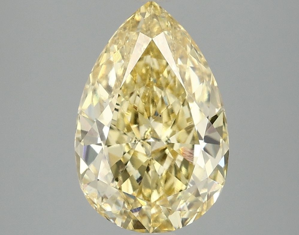 Loose Diamond - PEAR 3.11ct Fancy Vivid Yellow VS2: Loose Diamond - PEAR 3.11ct Fancy Vivid Yellow VS2 Source: This is a real non-mined Diamond that has been grown in a lab Shape: PEAR Carats: 3.11 Color: Fancy Vivid Yellow Certification: IGI Video: