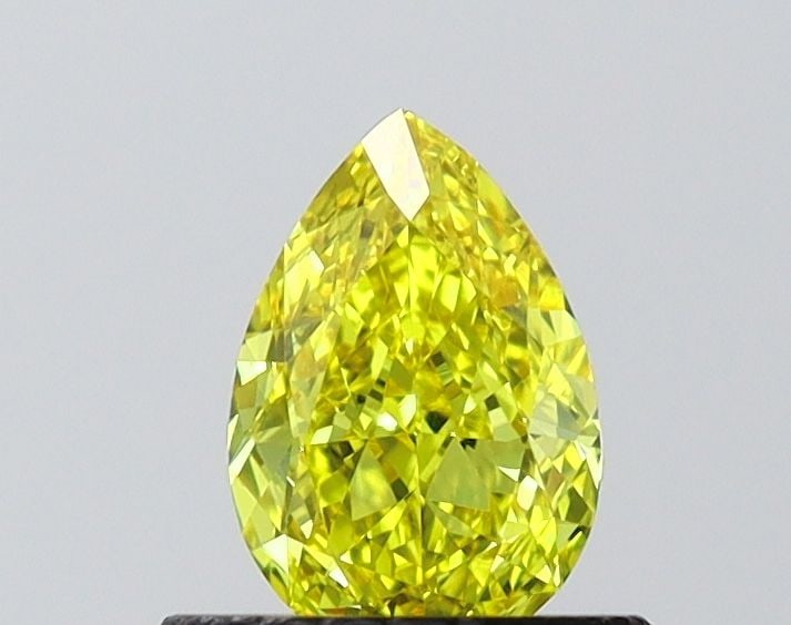 Loose Diamond - PEAR 0.74ct Fancy Vivid Yellow VVS1: Loose Diamond - PEAR 0.74ct Fancy Vivid Yellow VVS1 Source: This is a real non-mined Diamond that has been grown in a lab Shape: PEAR Carats: 0.74 Color: Fancy Vivid Yellow Certification: IGI Video: