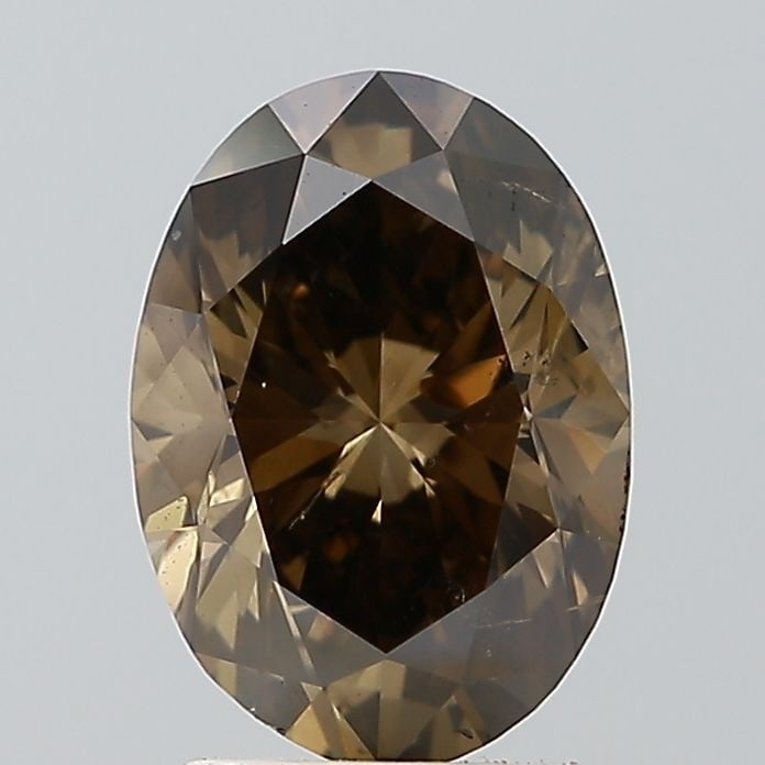 Loose Diamond - OVAL 2.05ct Fancy Brown SI2: Loose Diamond - OVAL 2.05ct Fancy Brown SI2 Source: Natural Shape: OVAL Carats: 2.05 Color: Fancy Brown Certification: NONE Video: Video Link The Diamond Depot Guarantee: All items in this auction