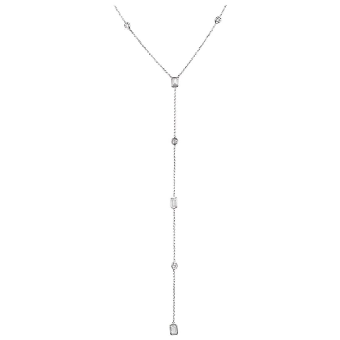 18k White Gold Diamond Yard Necklace 2.52ct 18in: 18k White Gold Diamond Yard Necklace 2.52ct 18in Diamonds by the Yard necklace in 18k white gold, set with 11 diamonds totaling 2.52 ct in round and emerald cuts. The necklace features bezel-set and d