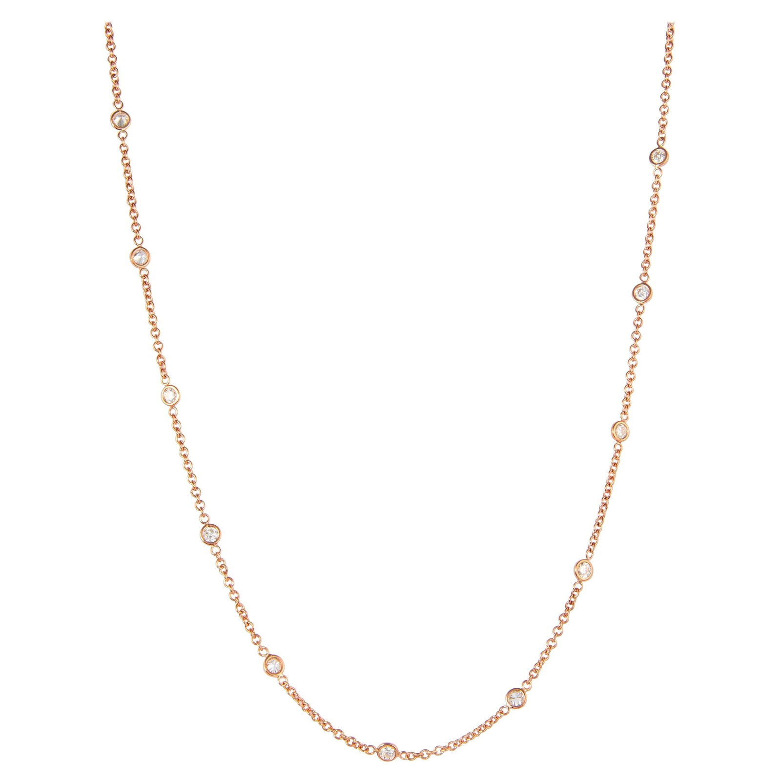 18k Rose Gold Diamond By the Yard Necklace 1.09ct 20 In: 18k Rose Gold Diamond By the Yard Necklace 1.09ct 20 In Modern diamonds by the yard necklace featuring round brilliant diamonds bezel set in 18k rose gold. This un-used necklace has a total diamond we
