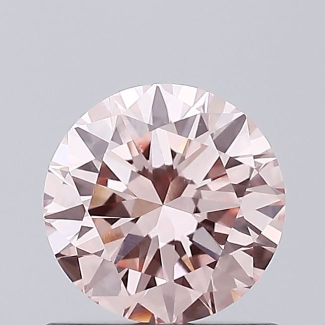 Loose Diamond - ROUND 0.67ct Fancy Intense Pink VVS2: Loose Diamond - ROUND 0.67ct Fancy Intense Pink VVS2 Source: This is a real non-mined Diamond that has been grown in a lab Shape: ROUND Carats: 0.67 Color: Fancy Intense Pink Certification: IGI