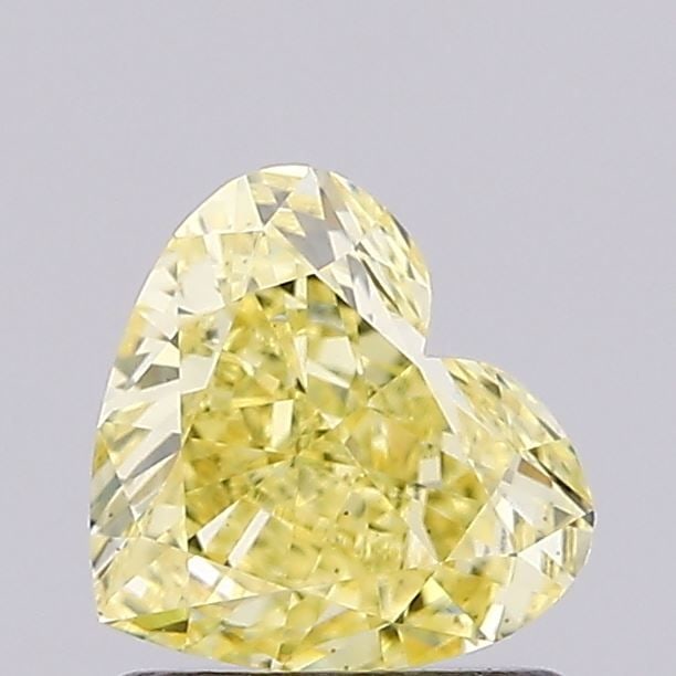 Loose Diamond - HEART 1.03ct Fancy Intense Yellow VS1: Loose Diamond - HEART 1.03ct Fancy Intense Yellow VS1 Source: This is a real non-mined Diamond that has been grown in a lab Shape: HEART Carats: 1.03 Color: Fancy Intense Yellow Certification: IGI Vid