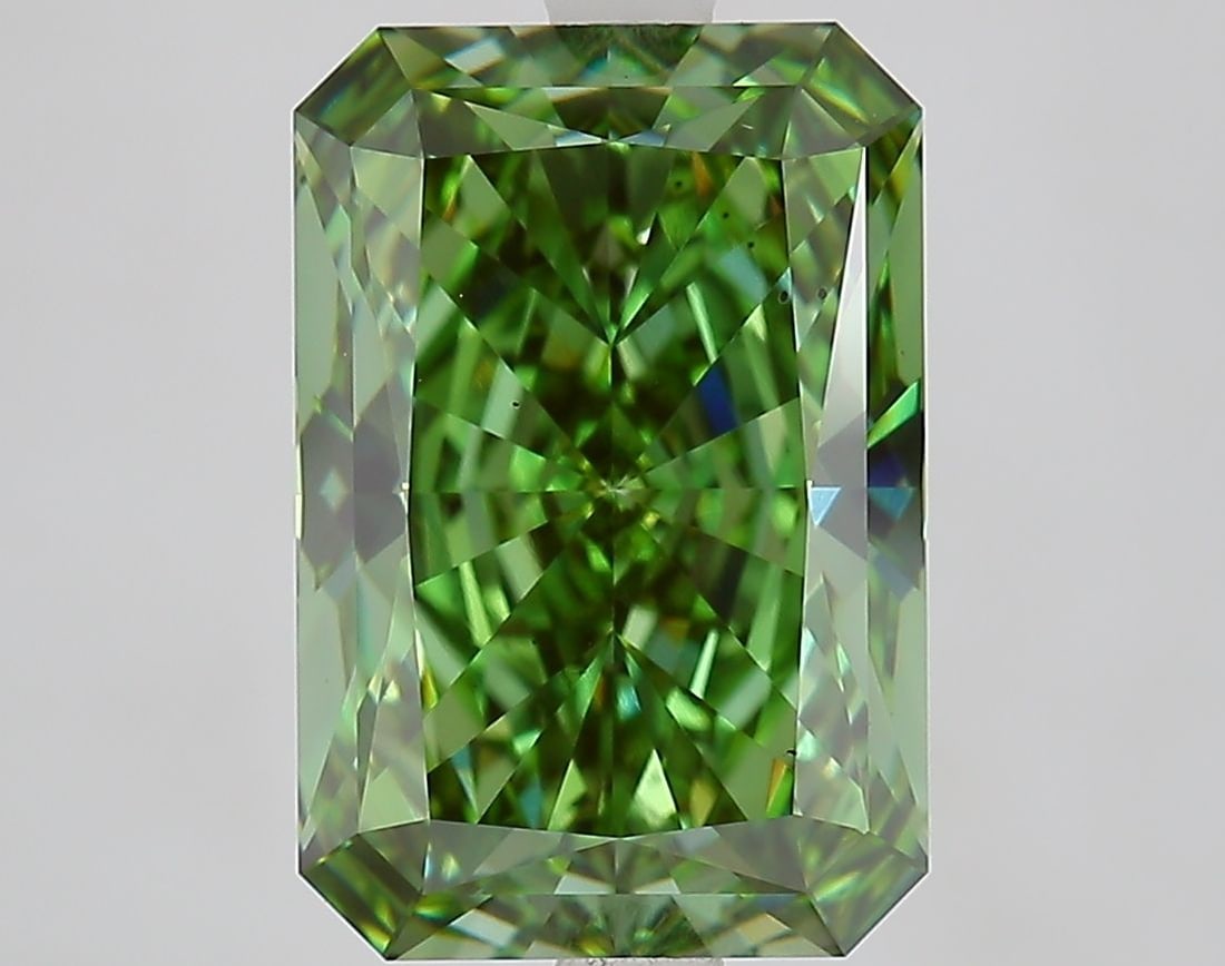 Loose Diamond - RADIANT 5.08ct Fancy Vivid Green VS2: Loose Diamond - RADIANT 5.08ct Fancy Vivid Green VS2 Source: This is a real non-mined Diamond that has been grown in a lab Shape: RADIANT Carats: 5.08 Color: Fancy Vivid Green Certification: IGI Video