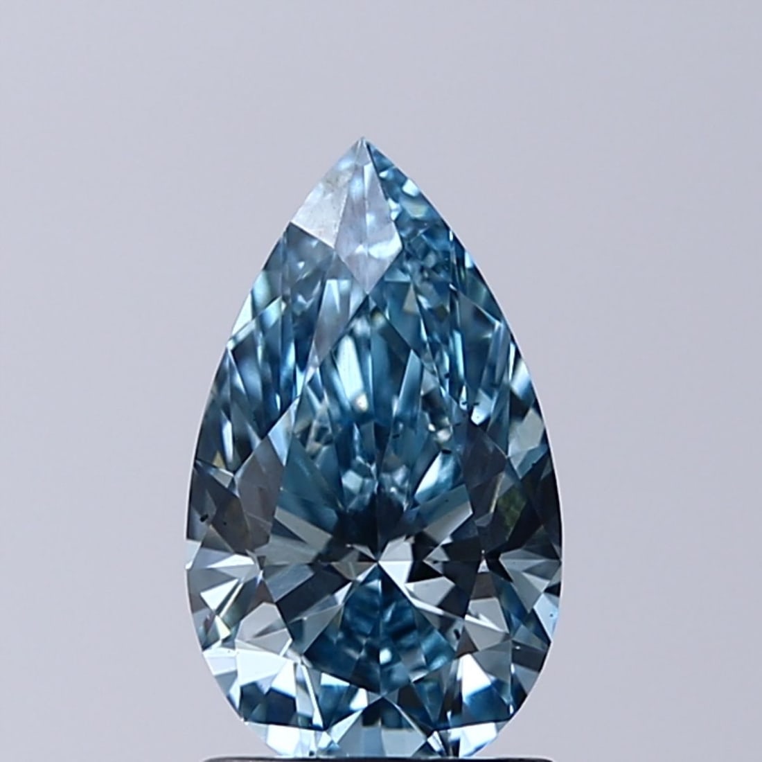 Loose Diamond - PEAR 1.21ct Fancy Vivid Blue VS2: Loose Diamond - PEAR 1.21ct Fancy Vivid Blue VS2 Source: This is a real non-mined Diamond that has been grown in a lab Shape: PEAR Carats: 1.21 Color: Fancy Vivid Blue Certification: IGI Video: