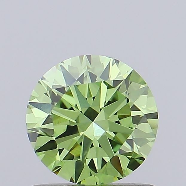 Loose Diamond - ROUND 0.87ct Fancy Vivid Green VS1: Loose Diamond - ROUND 0.87ct Fancy Vivid Green VS1 Source: This is a real non-mined Diamond that has been grown in a lab Shape: ROUND Carats: 0.87 Color: Fancy Vivid Green Certification: IGI Video: