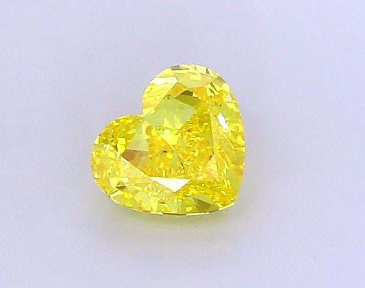 Loose Diamond - HEART 1.89ct Fancy Vivid Yellow VVS2: Loose Diamond - HEART 1.89ct Fancy Vivid Yellow VVS2 Source: This is a real non-mined Diamond that has been grown in a lab Shape: HEART Carats: 1.89 Color: Fancy Vivid Yellow Certification: IGI Video:
