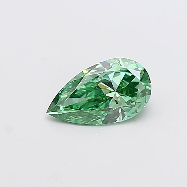 Loose Diamond - PEAR 0.9ct Fancy Vivid Green VS1: Loose Diamond - PEAR 0.9ct Fancy Vivid Green VS1 Source: This is a real non-mined Diamond that has been grown in a lab Shape: PEAR Carats: 0.9 Color: Fancy Vivid Green Certification: IGI Video: