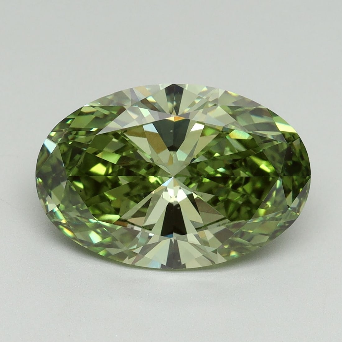 Loose Diamond - OVAL 4.08ct Fancy Vivid Green VS1: Loose Diamond - OVAL 4.08ct Fancy Vivid Green VS1 Source: This is a real non-mined Diamond that has been grown in a lab Shape: OVAL Carats: 4.08 Color: Fancy Vivid Green Certification: IGI Video: