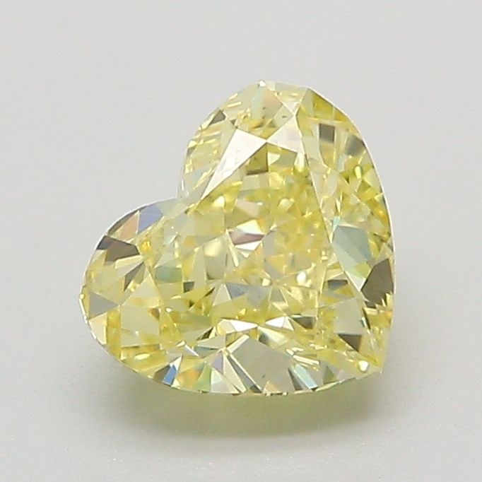 Loose Diamond - HEART 1.29ct Fancy Yellow VVS2: Loose Diamond - HEART 1.29ct Fancy Yellow VVS2 Source: This is a real non-mined Diamond that has been grown in a lab Shape: HEART Carats: 1.29 Color: Fancy Yellow Certification: IGI The Diamond Depot 