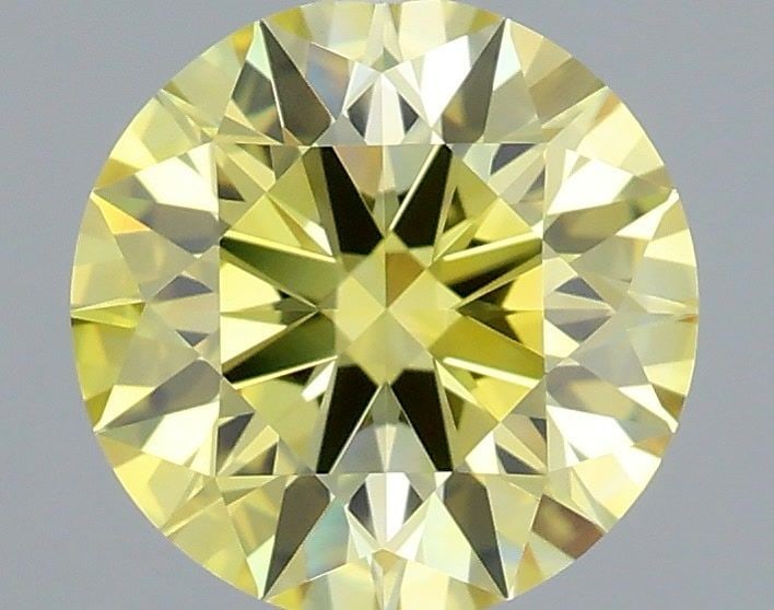 Ideal Loose Diamond - ROUND 0.97ct Fancy Vivid Yellow VS1: Ideal Loose Diamond - ROUND 0.97ct Fancy Vivid Yellow VS1 Source: This is a real non-mined Diamond that has been grown in a lab Shape: ROUND Carats: 0.97 Color: Fancy Vivid Yellow Certification: IGI V