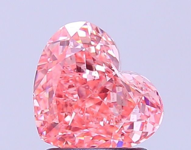 Loose Diamond - HEART 1.58ct Fancy Vivid Pink VS2: Loose Diamond - HEART 1.58ct Fancy Vivid Pink VS2 Source: This is a real non-mined Diamond that has been grown in a lab Shape: HEART Carats: 1.58 Color: Fancy Vivid Pink Certification: IGI Video: