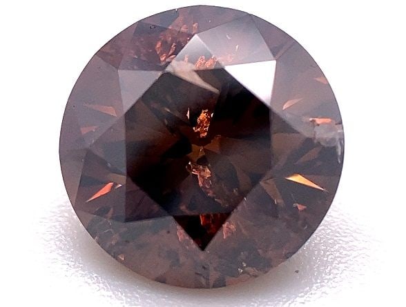 Loose Diamond - ROUND 2.24ct Brown I1: Loose Diamond - ROUND 2.24ct Brown I1 Source: Natural Shape: ROUND Carats: 2.24 Color: Brown Certification: OTHER The Diamond Depot Guarantee: All items in this auction are guaranteed to be 100% authe
