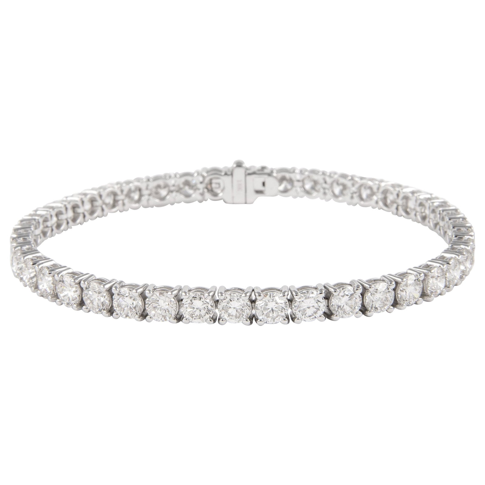 18k White Gold Diamond Tennis Bracelet 9.74ct: 18k White Gold Diamond Tennis Bracelet 9.74ct Exquisite and timeless diamond tennis bracelet set with 42 round brilliant diamonds totaling 9.74 carats. The diamonds are approximately H/I color and VS 