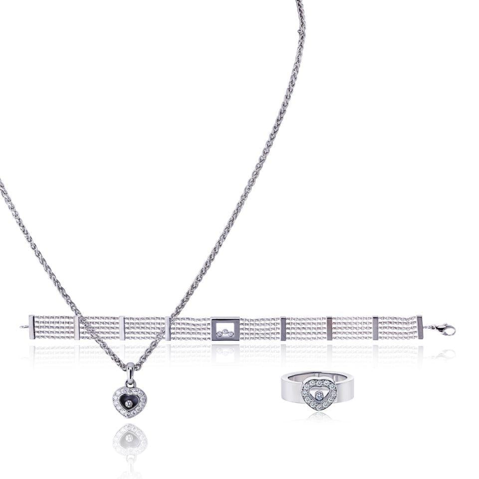 Chopard Happy Diamonds 18K White Gold Jewelry Suite: Chopard Happy Diamonds 18K White Gold Jewelry Suite Pre-owned Chopard Happy Diamonds jewelry set crafted in 18K white gold. This set offers the signature Happy Diamonds style in a coordinated fine jew