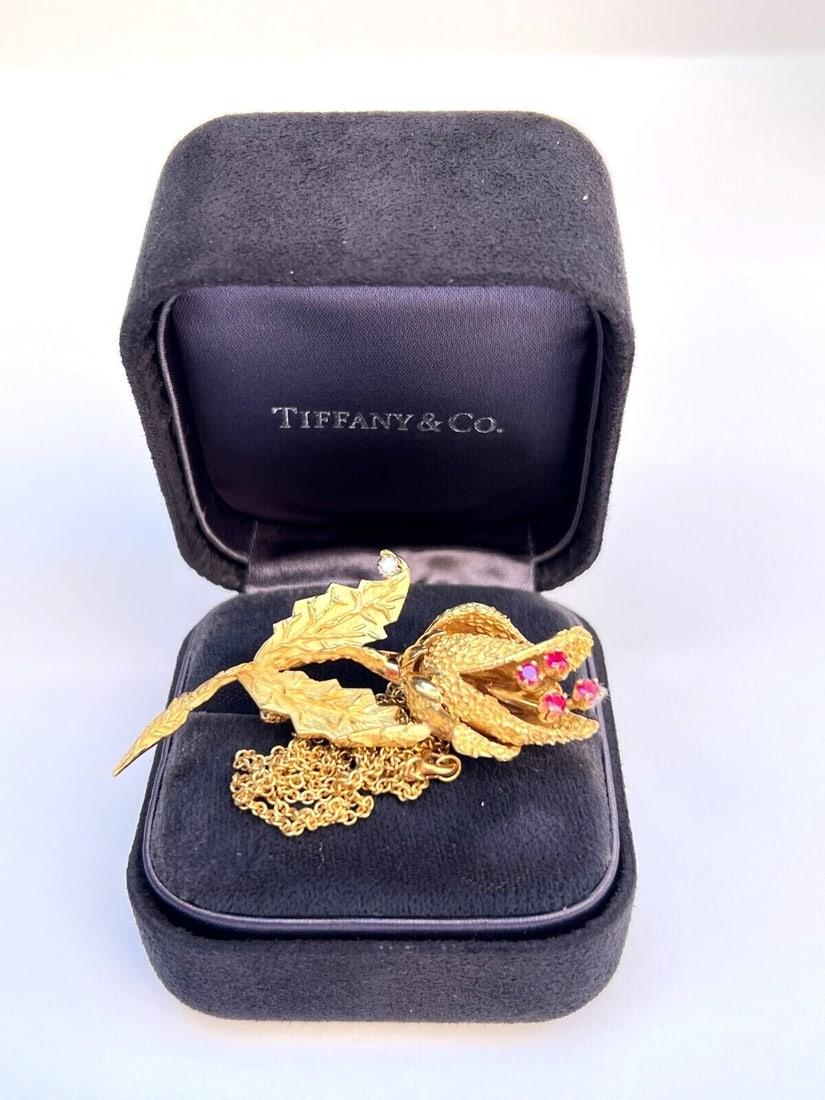 Tiffany & Co. 18K Yellow Gold Ruby Diamond Necklace Brooch with Original Boxes: Tiffany & Co. 18K Yellow Gold Ruby Diamond Necklace Brooch with Original Boxes Tiffany & Co. necklace brooch crafted in 18k yellow gold, featuring ruby and diamond accents. This piece includes its ori