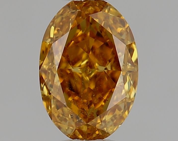 Loose Diamond - OVAL 0.31ct Fancy Deep Orangey Yellow SI2: Loose Diamond - OVAL 0.31ct Fancy Deep Orangey Yellow SI2 Source: Natural Shape: OVAL Carats: 0.31 Color: Fancy Deep Orangey Yellow Certification: NONE Video: