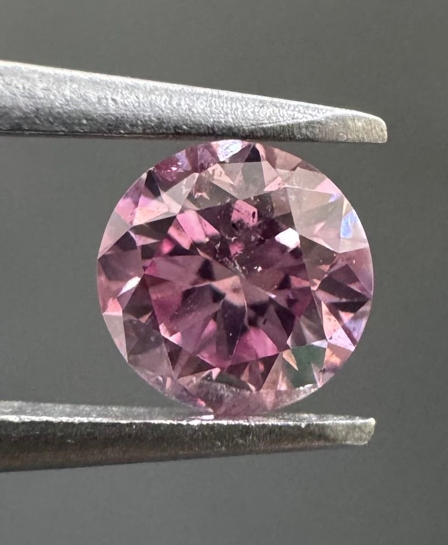 Loose Diamond - ROUND 0.18ct Fancy Intense Purplish Pink I1: Loose Diamond - ROUND 0.18ct Fancy Intense Purplish Pink I1 Source: Natural Shape: ROUND Carats: 0.18 Color: Fancy Intense Purplish Pink Certification: GIA The Diamond Depot Guarantee: All items in th