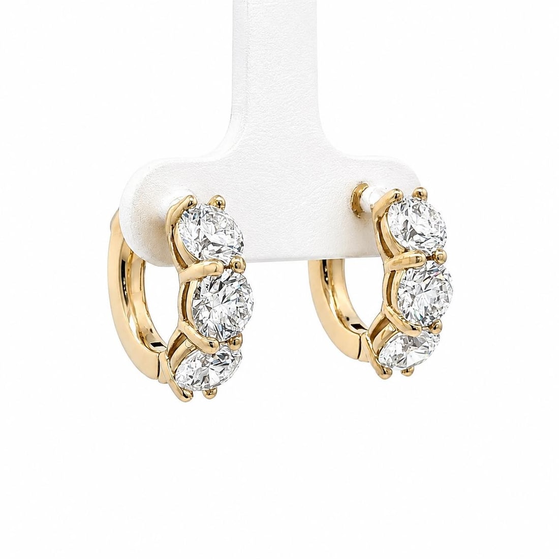 GIA Certified 14k Yellow Gold Diamond Hoop Earrings 2.75ctw I SI1: GIA Certified 14k Yellow Gold Diamond Hoop Earrings 2.75ctw I SI1 Pair of huggie hoop earrings crafted in solid 14k yellow gold and set with six natural genuine round brilliant cut diamonds. The diamo