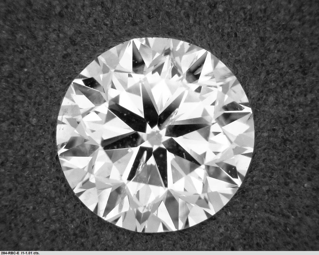 Loose Diamond - ROUND 1.01ct E I1: Loose Diamond - ROUND 1.01ct E I1 Source: Natural Shape: ROUND Carats: 1.01 Color: E Clarity: I1 Certification: GIA The Diamond Depot Guarantee: All items in this auction are guaranteed to be 100% aut
