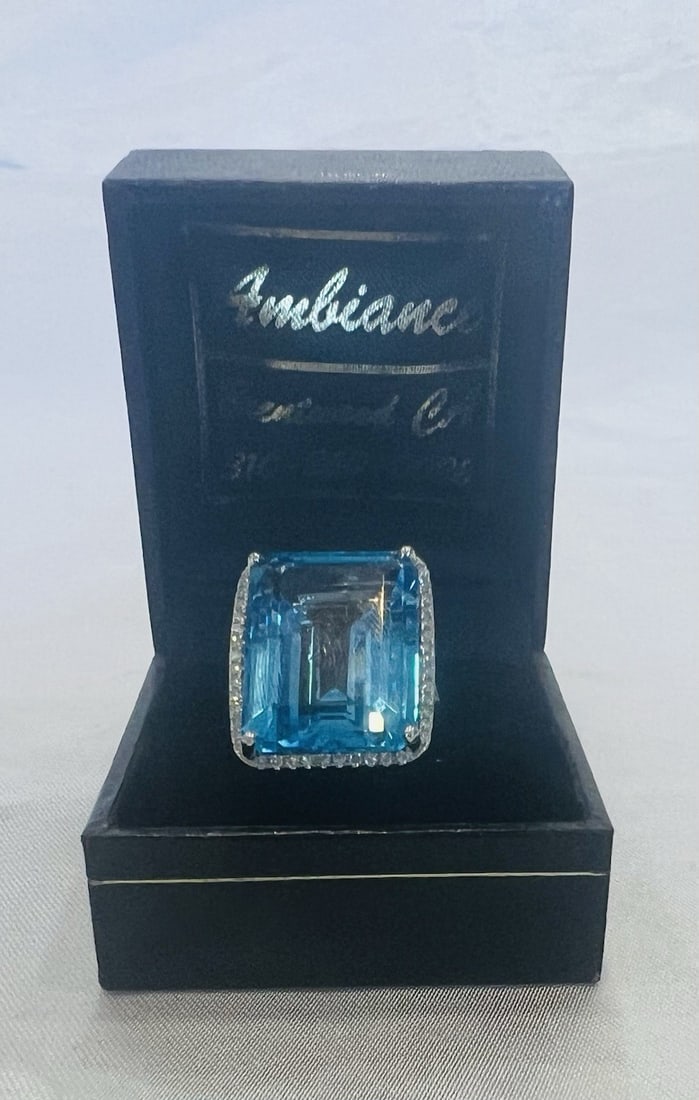 14k White Gold Blue Topaz and Diamond Ring Size 8.5: 14k White Gold Blue Topaz and Diamond Ring Size 8.5 Pre-owned unbranded ring crafted in 14k white gold, featuring a blue topaz accented with diamonds. The ring has a detailed design and workmanship, a