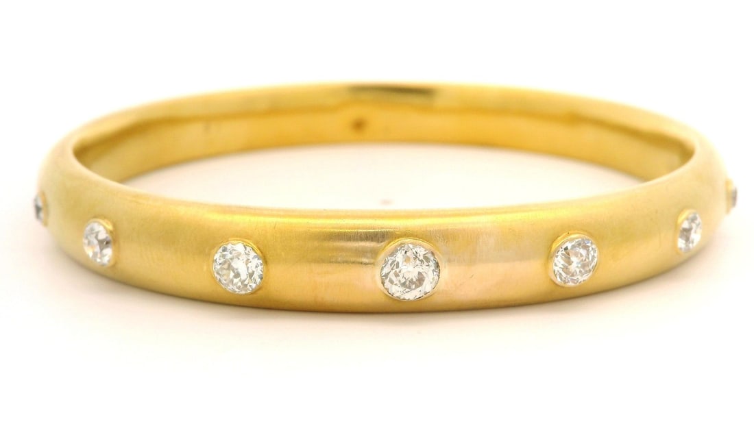 Antique Riker Brothers 18k Gold 2ctw Old European Diamond Bangle Bracelet: Antique Riker Brothers 18k Gold 2ctw Old European Diamond Bangle Bracelet This exquisite Antique Riker Brothers bangle bracelet features a stunning array of (7) natural genuine Old European cut diamon