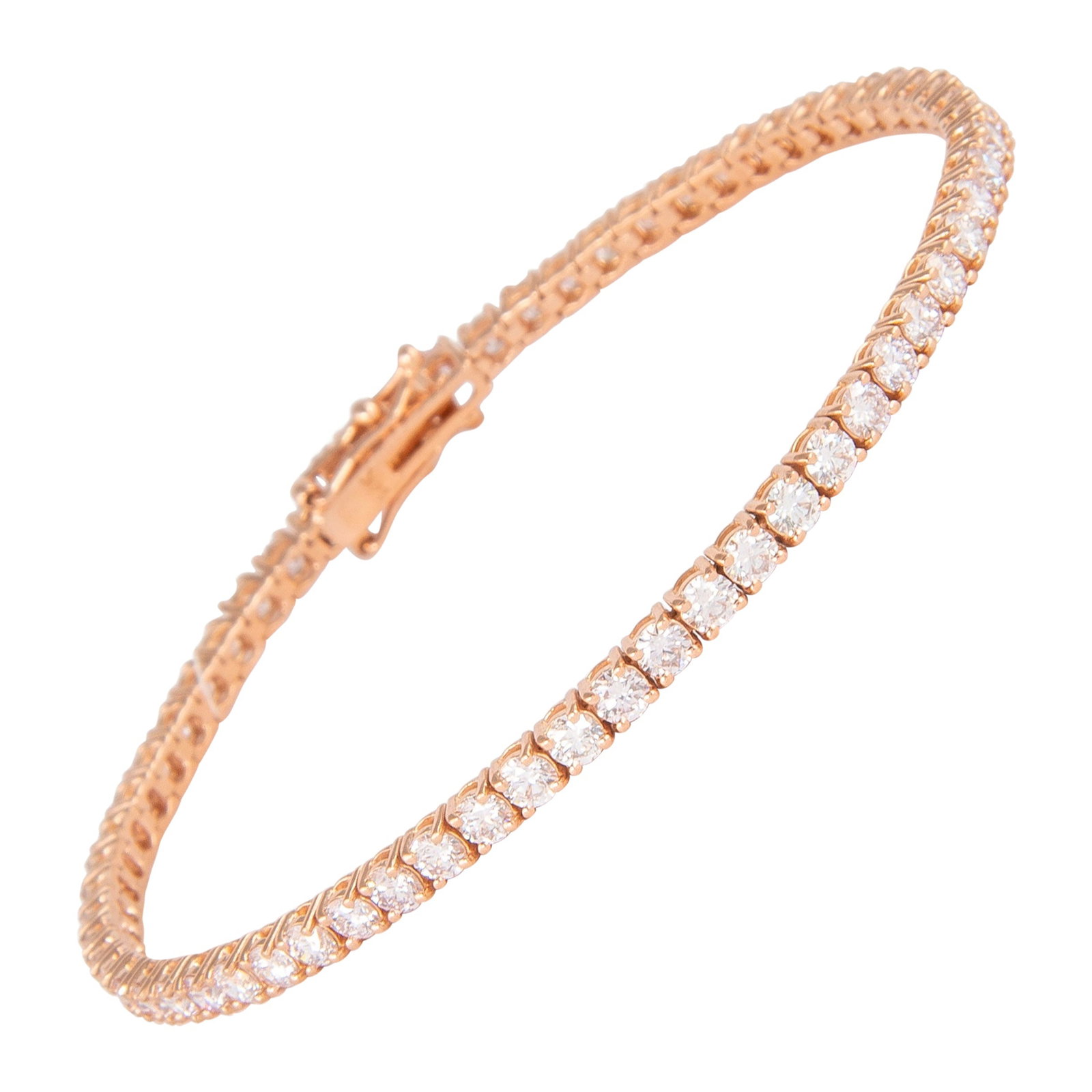 14k Rose Gold 4.69ct Diamond Tennis Bracelet 7 in: 14k Rose Gold 4.69ct Diamond Tennis Bracelet 7 in Diamond tennis bracelet set with 62 round brilliant cut diamonds totaling 4.69 ct in 14k rose gold. The diamonds are approximately Very Light Pink col