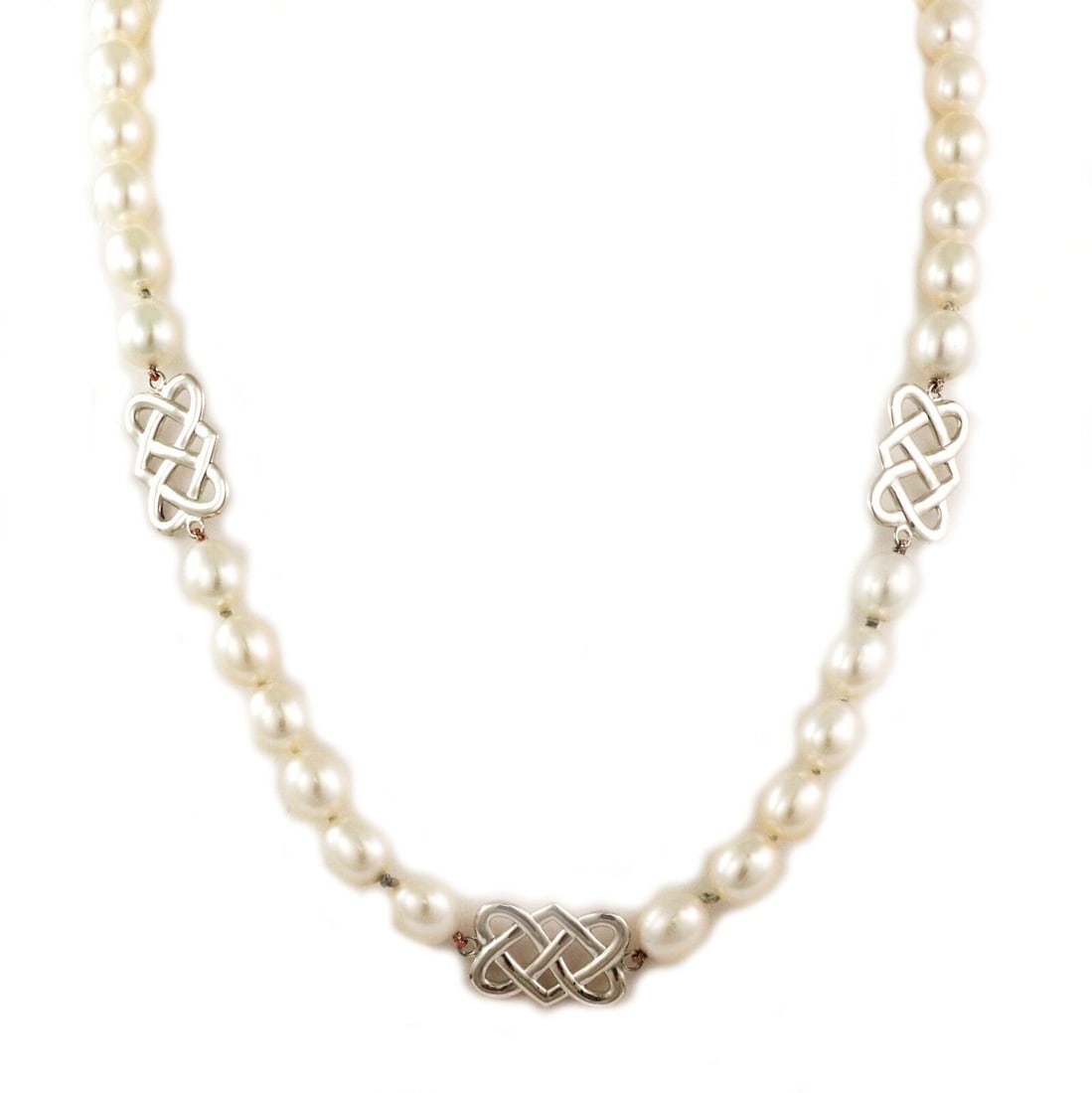 Tiffany & Co. Paloma Picasso pearl lattice link necklace in sterling silver 18": Tiffany & Co. Paloma Picasso pearl lattice link necklace in sterling silver 18" Pre-owned Tiffany & Co. Paloma Picasso necklace featuring a refined lattice link design accented with freshwater pearls.